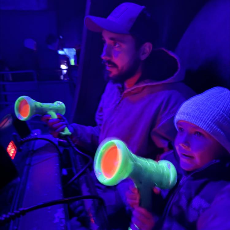 man and boy on ride