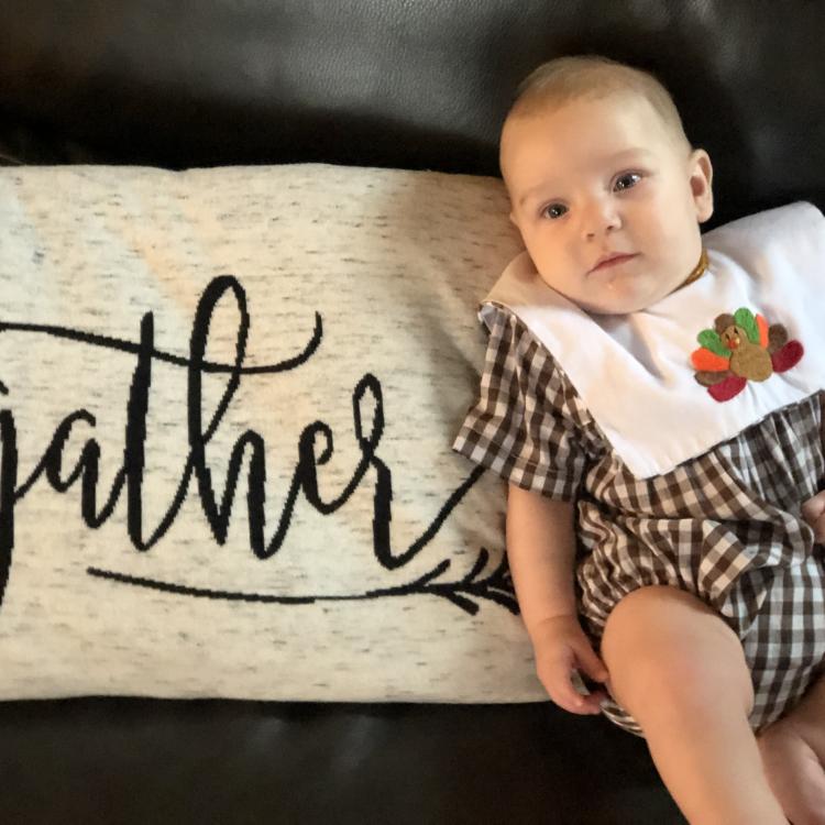 baby with turkey bib