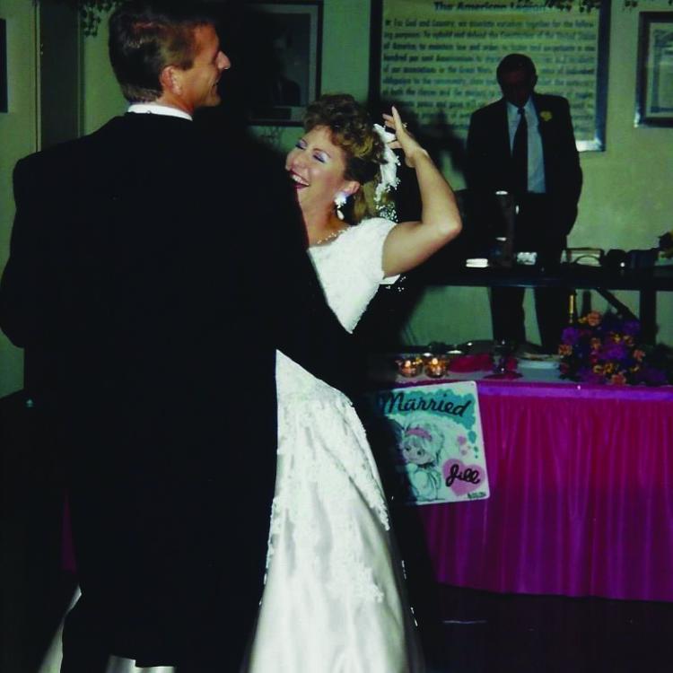 bride and groom dancing