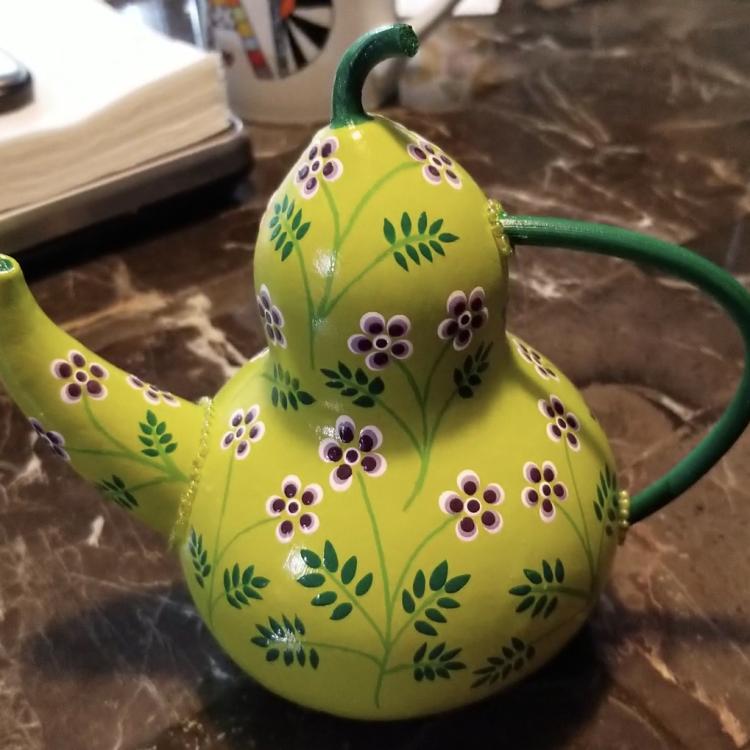 gourd painted like a teapot