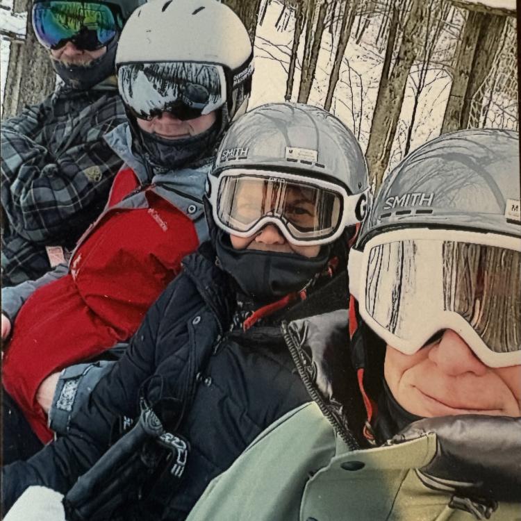 family on ski lift
