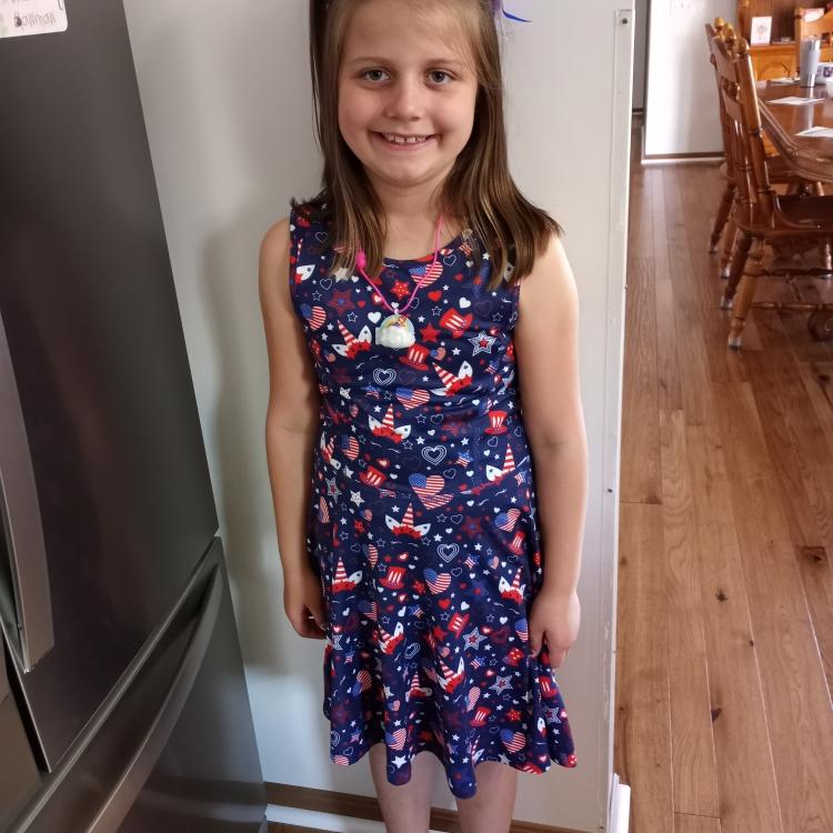 girl in red-white-and-blue dress
