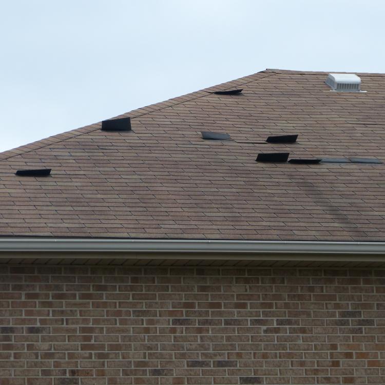 roof with loose shingles