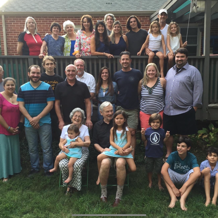 large family gathered outdoors