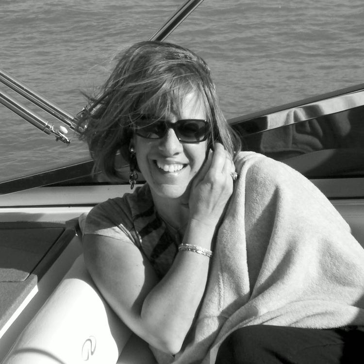 woman in sunglasses on boat