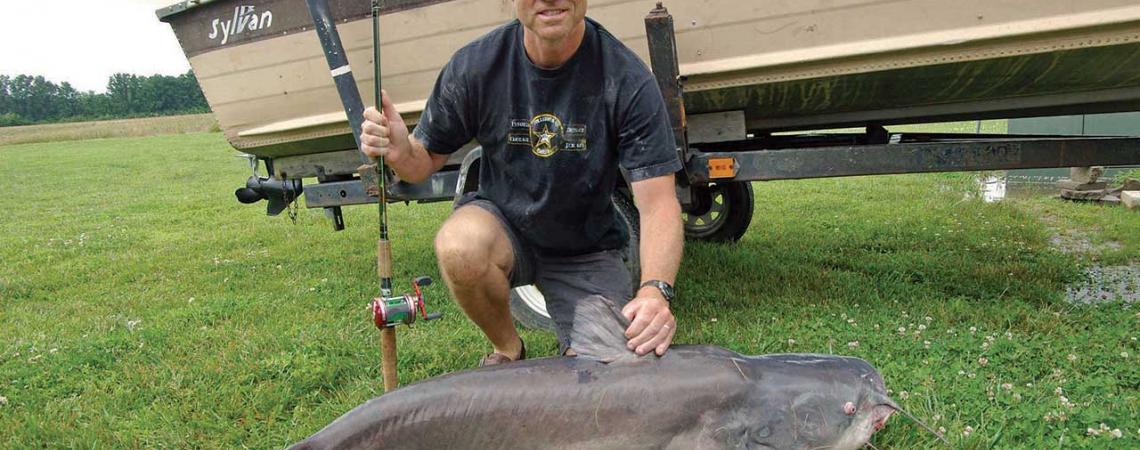 Chris Rolph with blue catfish