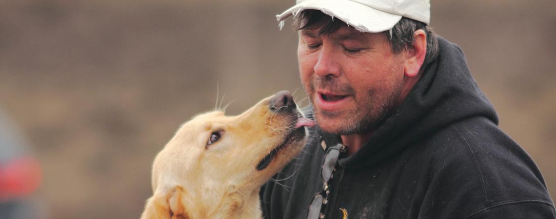 Greg Mahle with a dog