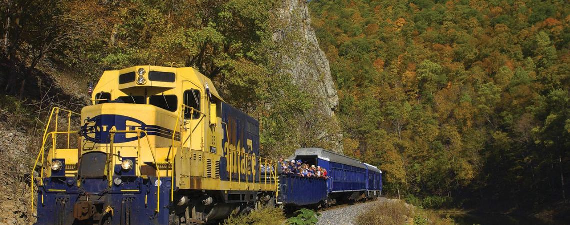 A photo of the Potomac Eagle carrying passengers through the mountains.