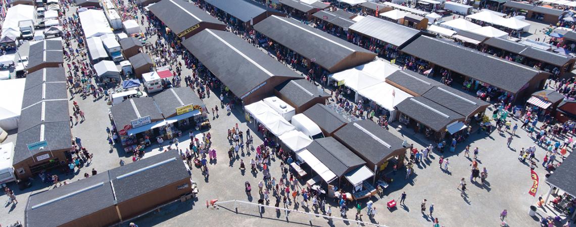 An overhead shot of Shipshewana Trading Place Auction & Flea Market packed with visitors.