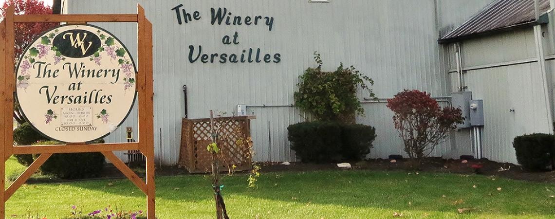 A picture of the Winery at Versailles sign.