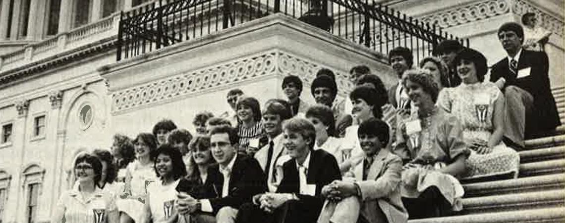 Students on the 1983 Ohio Youth Tour rest on the Capitol steps.
