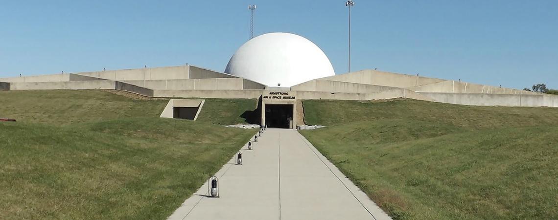 An outside view of the Armstrong Air and Space Museum, which resembles a moon base.