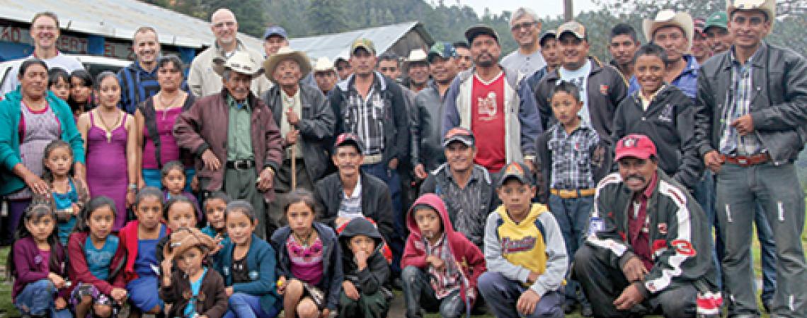 Villagers of La Soledad smile for a group photo.