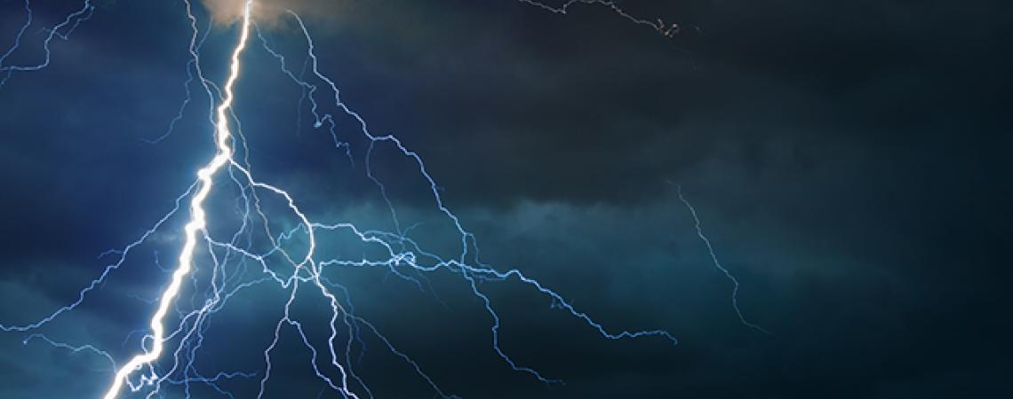 Lightning flashes in the middle of a storm.