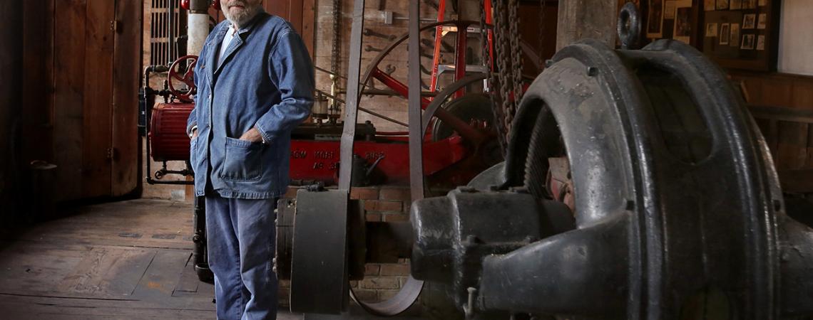 Willie Ludwig smiles inside the Ludwig Mill