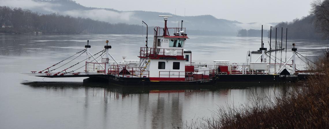 A ferry sits on the Ohio River