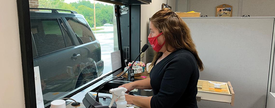 Co-op employee at drive-thru