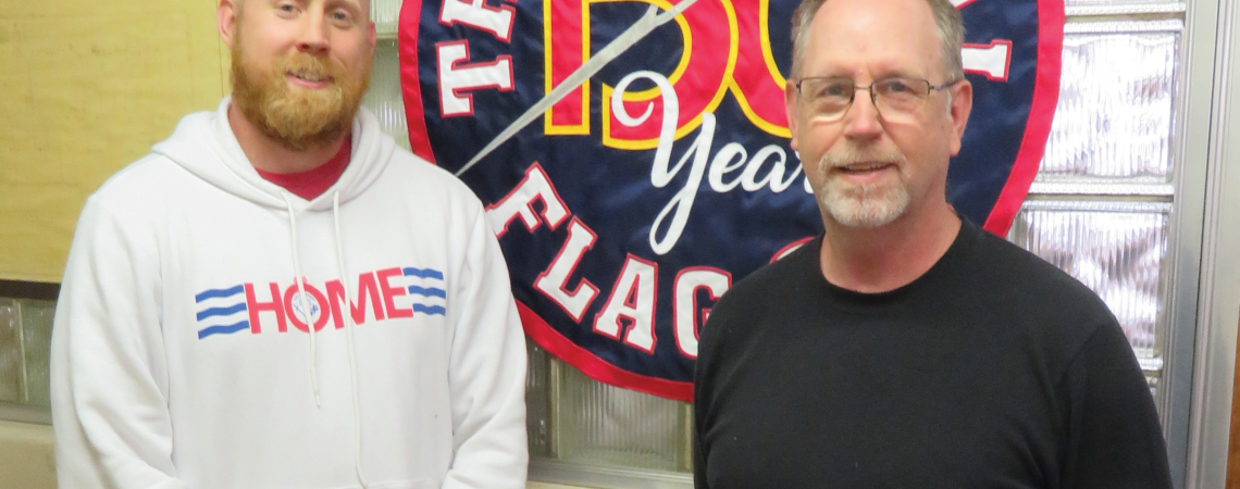 The National Flag Company, led by Artie Schaller (left) and his dad, Art Schaller Jr., produces more than a million flags and banners annually.