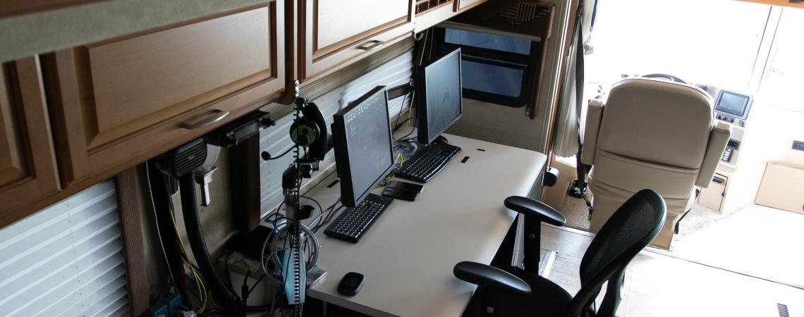 The control room in the UAS Center’s mobile command vehicle, called the SkyVision Bus. 