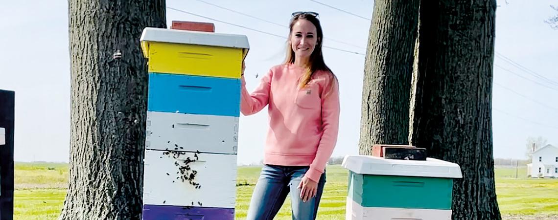 Missy Davis, staff accountant at Holmes-Wayne Electric Cooperative in Millersburg, keeps six beehives on her property and has created her own logo for the honey they produce.
