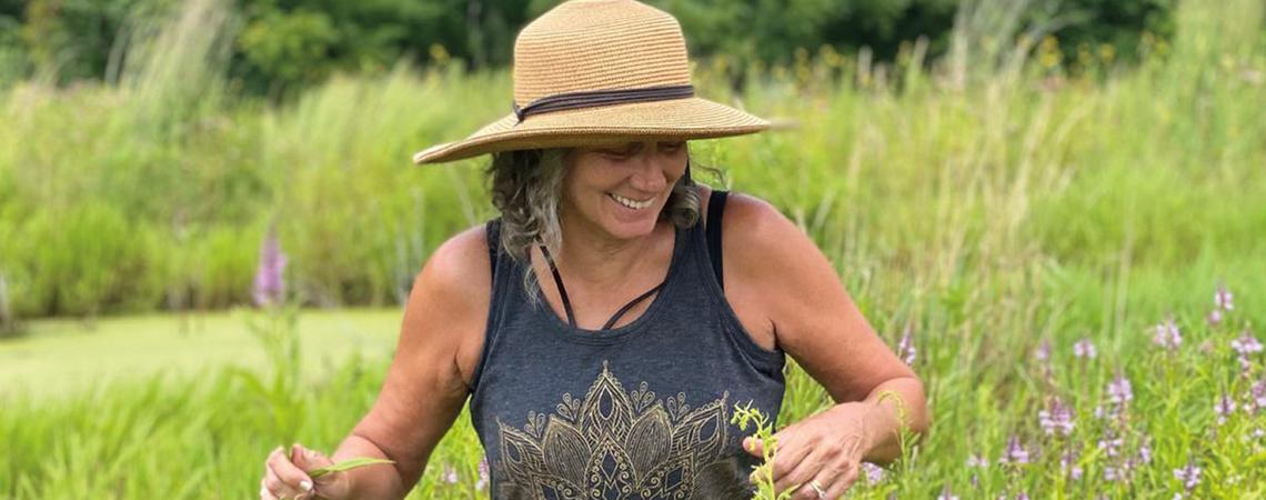 Jackie Driscoll explores her 8-acre pollinator garden in Lorain County. A master gardener volunteer, she’d been gardening since she was 8. 