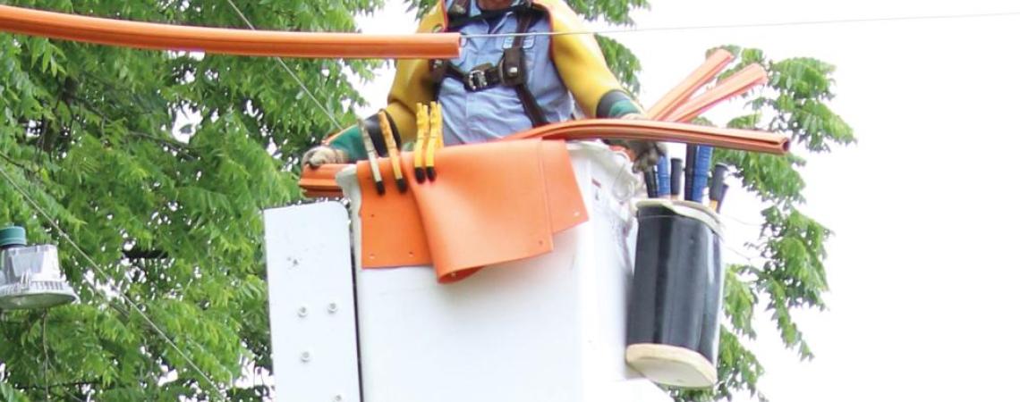 Dave says his job as a lineworker at Logan County Electric Cooperative is similar to his hobby because both require intense concentration on safety.
