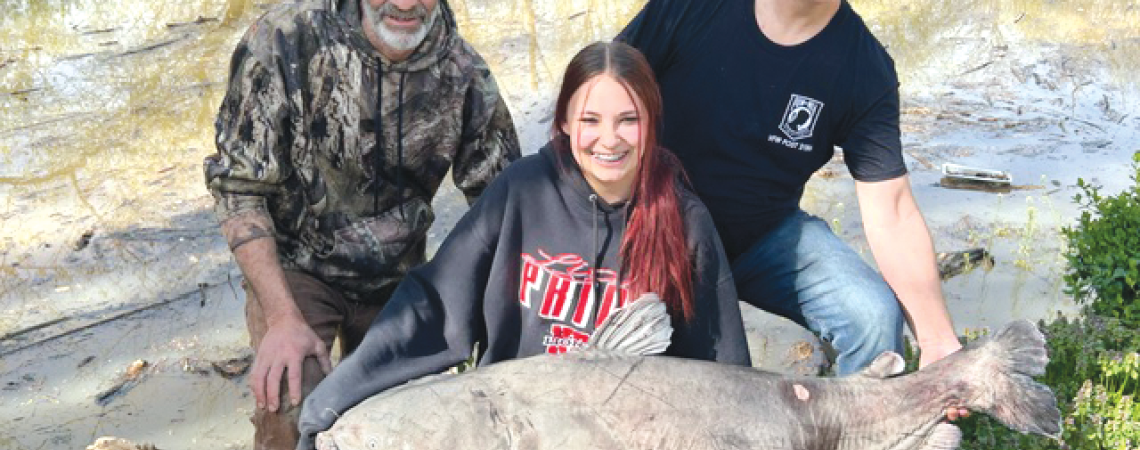 15-year-old Jaylynn Parker of New Richmond, Ohio, with her state record-breaking blue catfish.