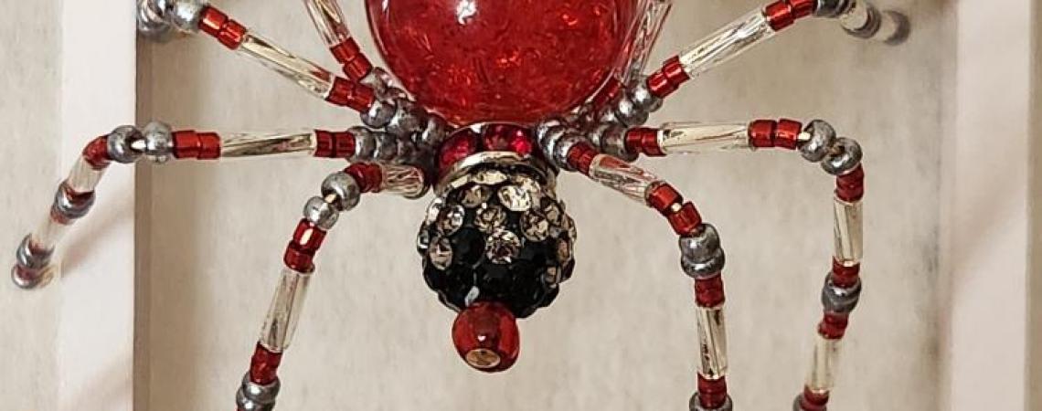 A Christmas spider made from precious stones and pearls