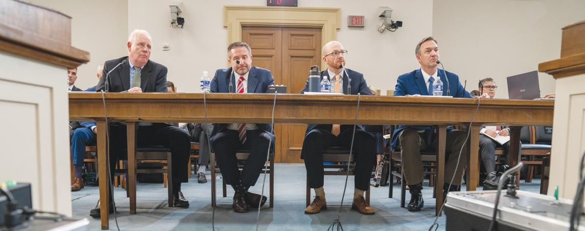 Pat O'Loughlin on a panel of other electric utility and environmental industry leaders