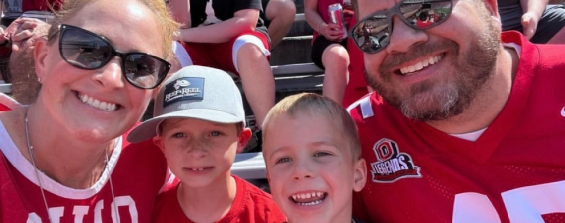 The McMullen family at a football game