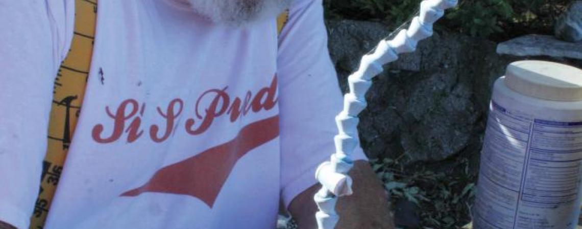 Charles Herndon working on a sculpture