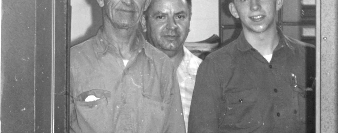three men in old black-and-white photo