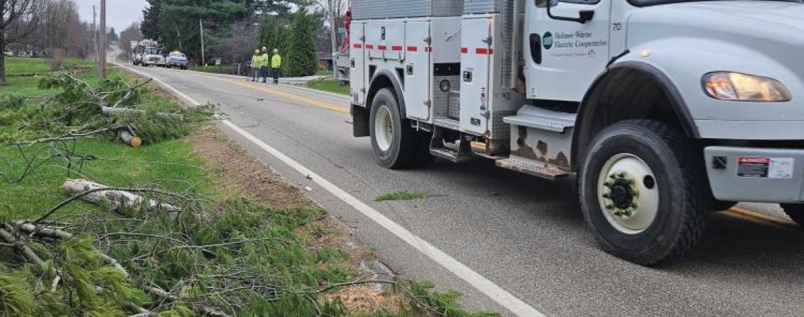 A bucket truck on the side of the road