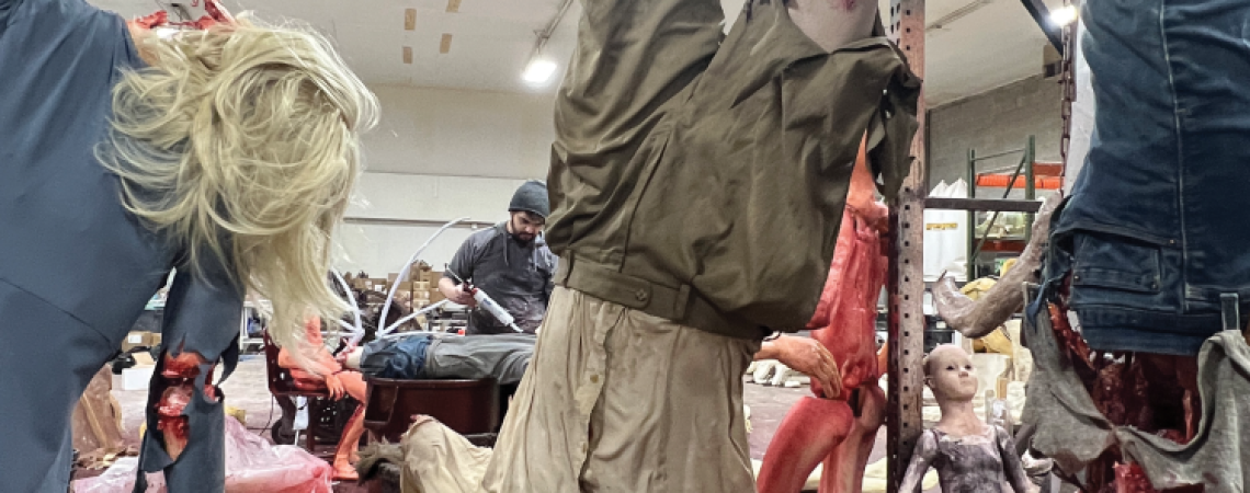 A realistic haunted-attraction sculpture