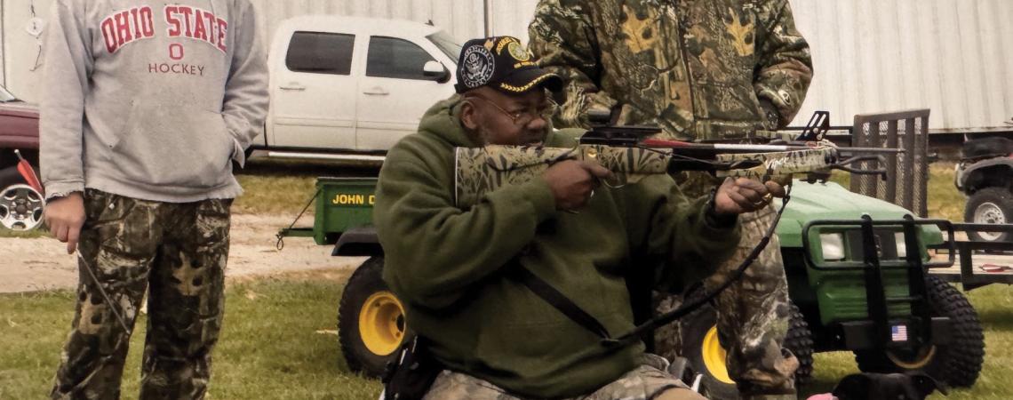 A veteran shooting a gun