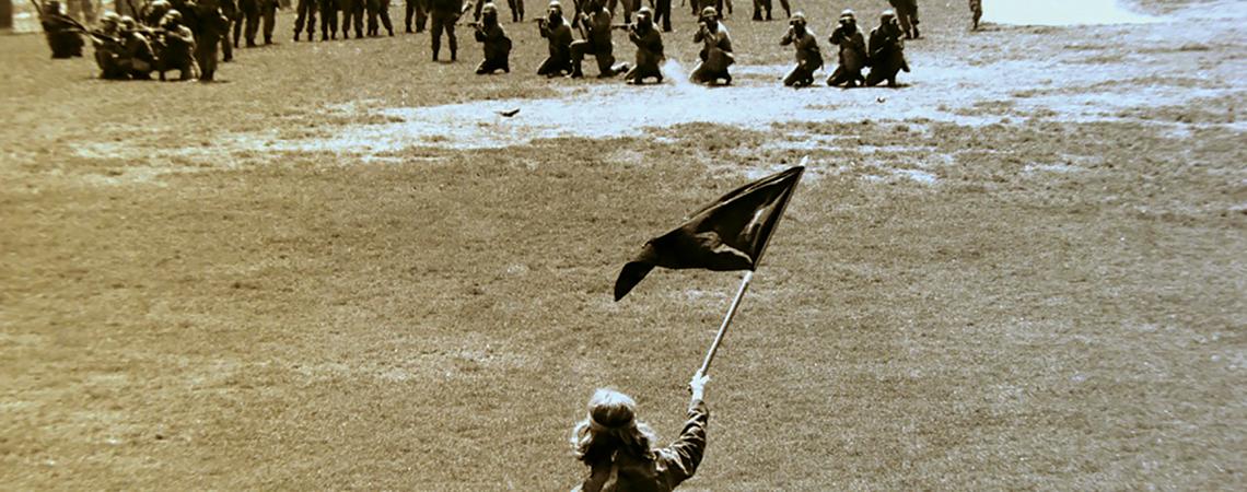 Alan Canfora waving flag