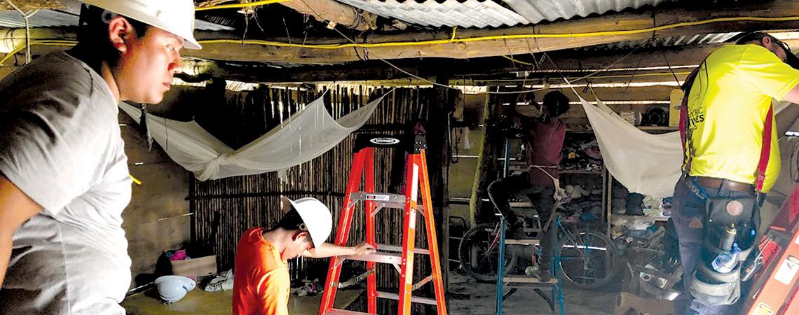 Linemen wiring home